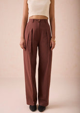 A Model Wearing Brown Cotton Twill The Bright Beginnings Organic Cotton Trousers, curated by Only Ethikal